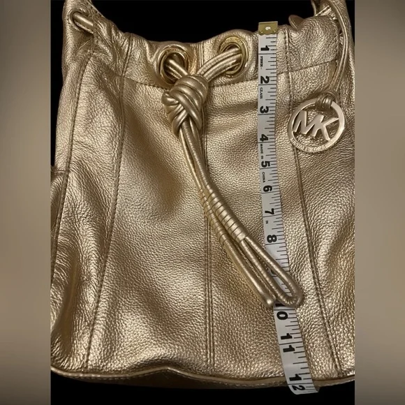 Michael Kors Metallic Gold Leather Drawstring Shoulder Bag. - Picture 10 of 16